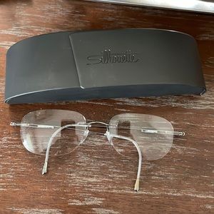 Titan 7534 10 6075 silver metallic rimless eyeglasses with case